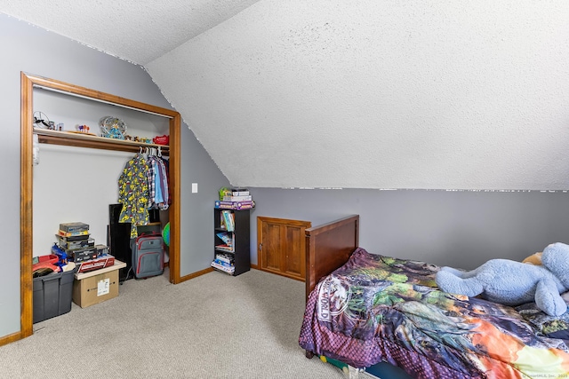 241 New London Rd, Colchester, CT 06415 - bedroom with vaulted ceiling, a textured ceiling, carpet floors, a closet, and baseboards