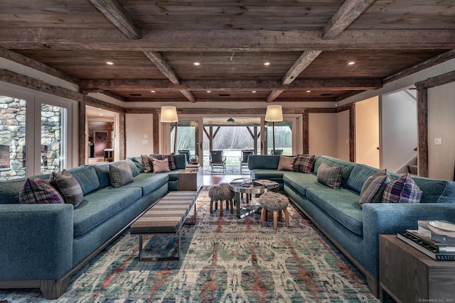 living room featuring wooden ceiling with exposed beams and recessed lighting