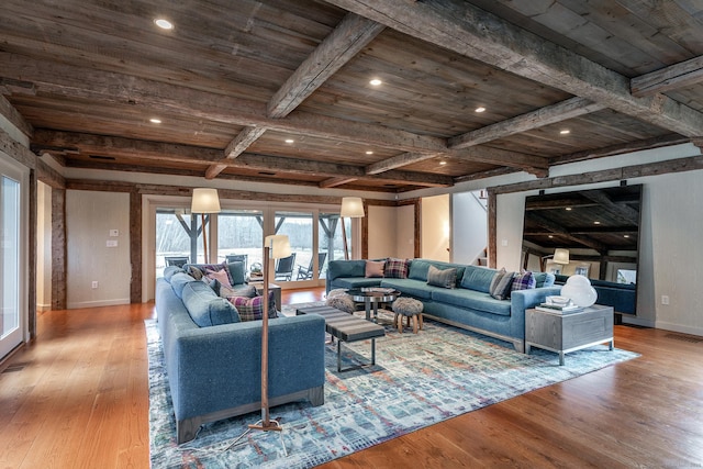 living area with wooden ceiling with exposed beams, wood finished floors, stairs, baseboards, and recessed lighting