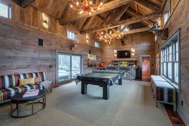 rec room featuring a chandelier, high vaulted ceiling, wood walls, billiards, and wood ceiling with exposed beams