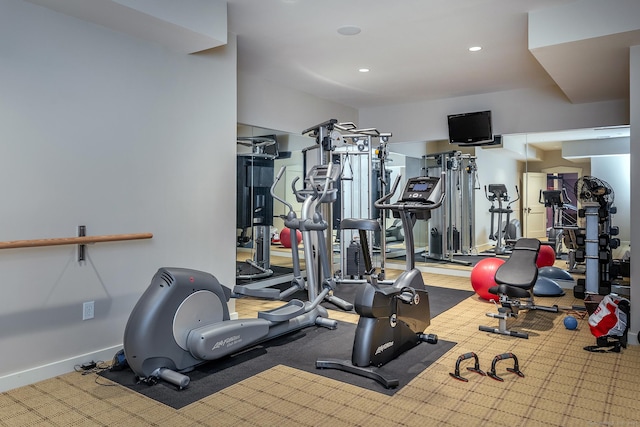exercise room with recessed lighting, baseboards, and carpet flooring