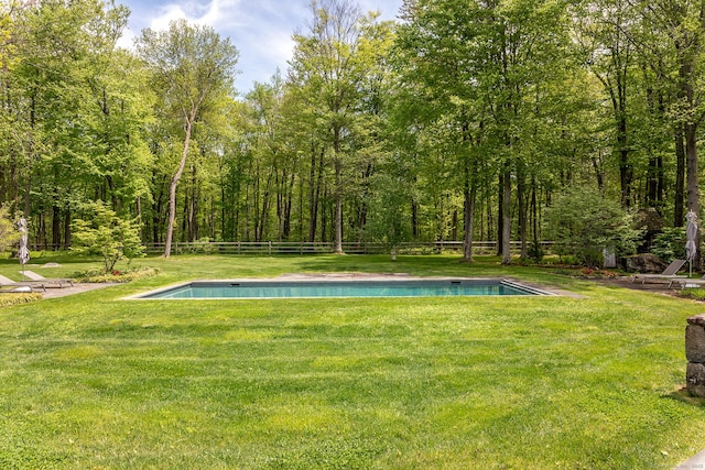 view of yard with an outdoor pool
