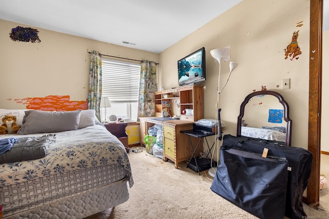 bedroom with light colored carpet