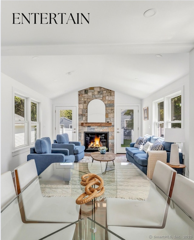 706 Judd St, Fairfield, CT 06825 - living room with vaulted ceiling and a stone fireplace