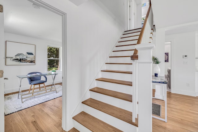 706 Judd St, Fairfield, CT 06825 - staircase with wood finished floors