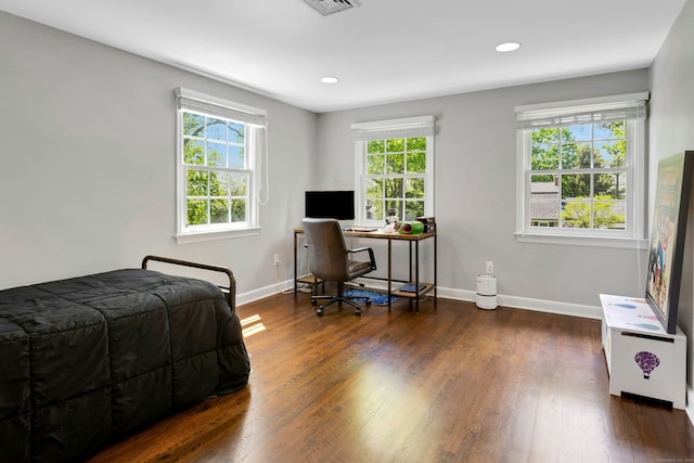 bedroom with baseboards, dark wood-style flooring, recessed lighting, and a desk