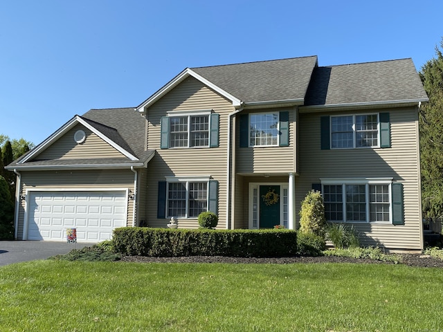539 Plains Rd, Milford, CT 06461 - view of front of home featuring an attached garage, driveway, a front yard, and roof with shingles