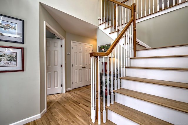 539 Plains Rd, Milford, CT 06461 - staircase with baseboards and wood finished floors