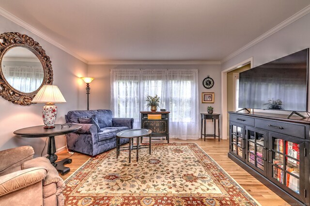 539 Plains Rd, Milford, CT 06461 - living area with wood finished floors, crown molding, and baseboards