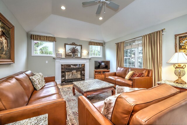 539 Plains Rd, Milford, CT 06461 - living area with healthy amount of natural light, ceiling fan, a fireplace, lofted ceiling, and recessed lighting