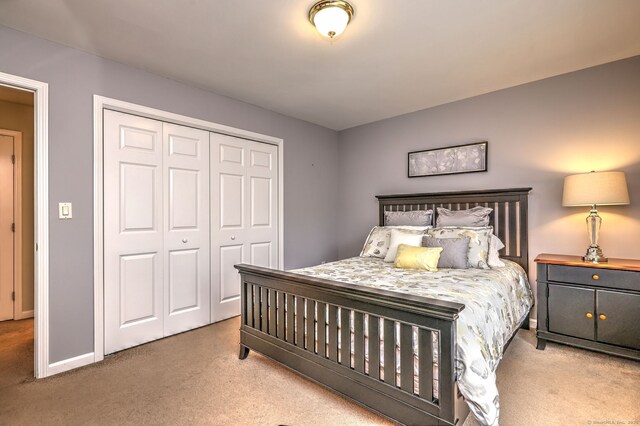 539 Plains Rd, Milford, CT 06461 - carpeted bedroom featuring a closet and baseboards