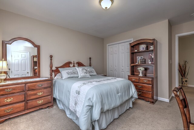 539 Plains Rd, Milford, CT 06461 - bedroom featuring light carpet, a closet, and baseboards