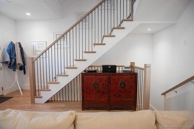42 Forest St Apt 3, New Canaan, CT 06840 - stairway featuring wood finished floors, recessed lighting, and baseboards