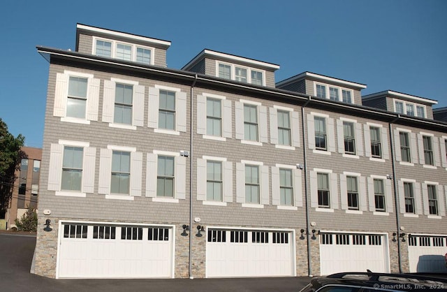 42 Forest St Apt 3, New Canaan, CT 06840 - view of property featuring an attached garage