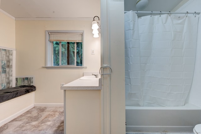 bathroom with vanity, shower / tub combo with curtain, and baseboards
