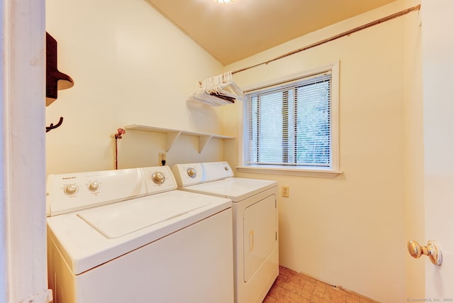laundry area with washing machine and clothes dryer