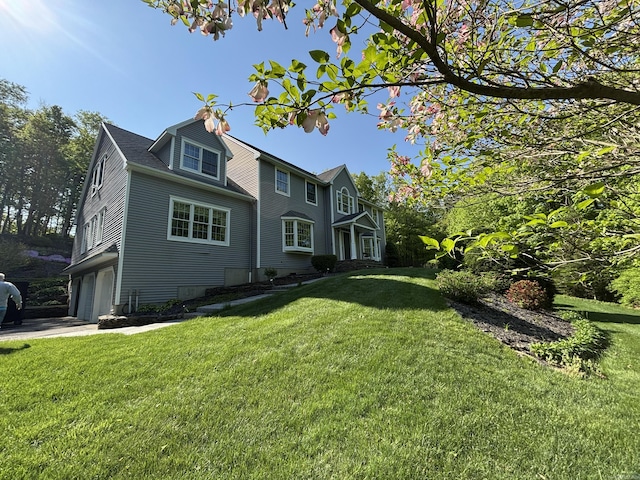 250 Wooding Hill Rd, Bethany, CT 06524 - view of front of property with an attached garage and a front yard