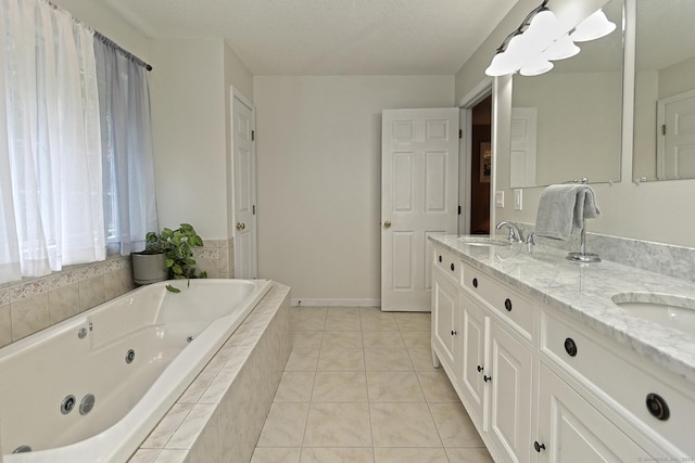 250 Wooding Hill Rd, Bethany, CT 06524 - bathroom featuring double vanity, a whirlpool tub, tile patterned floors, and baseboards