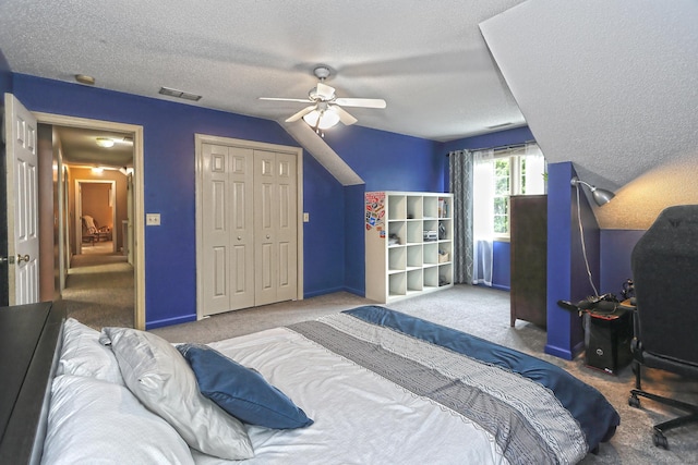 250 Wooding Hill Rd, Bethany, CT 06524 - carpeted bedroom with a textured ceiling, a closet, ceiling fan, baseboards, and vaulted ceiling