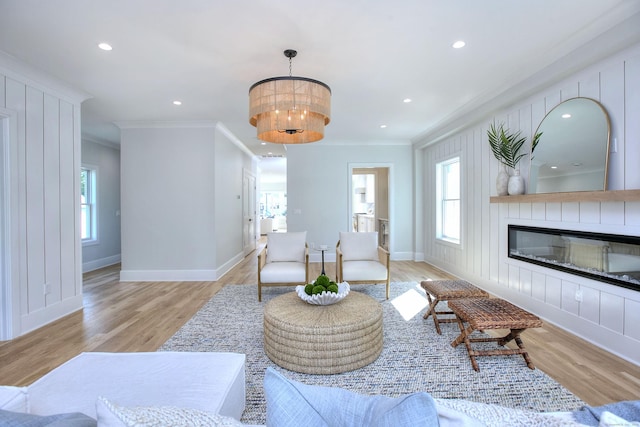 450 Penfield Rd, Fairfield, CT 06824 - living room with crown molding, healthy amount of natural light, baseboards, light wood-style flooring, and recessed lighting