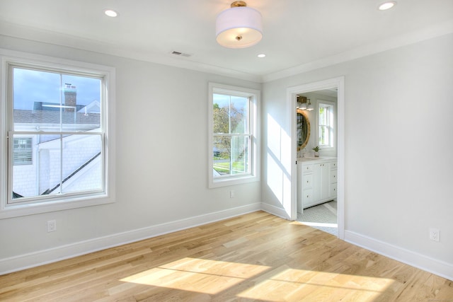 450 Penfield Rd, Fairfield, CT 06824 - unfurnished bedroom featuring baseboards, light wood-style flooring, ensuite bathroom, and recessed lighting