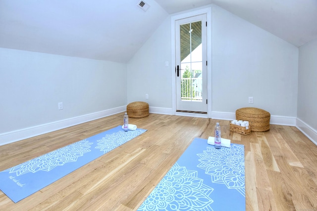 450 Penfield Rd, Fairfield, CT 06824 - workout room with vaulted ceiling, wood finished floors, and baseboards