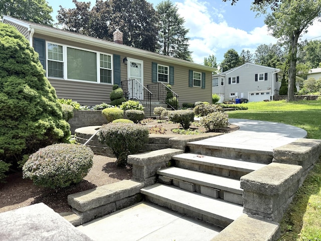 15-17 Beckerle St, Danbury, CT 06811 - ranch-style house with a chimney and a front lawn