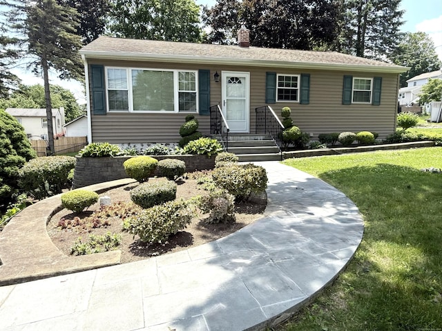 15-17 Beckerle St, Danbury, CT 06811 - view of front of house featuring a front yard and a chimney