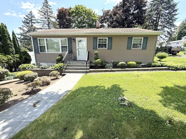 15-17 Beckerle St, Danbury, CT 06811 - view of front facade featuring a front lawn, a chimney, and entry steps