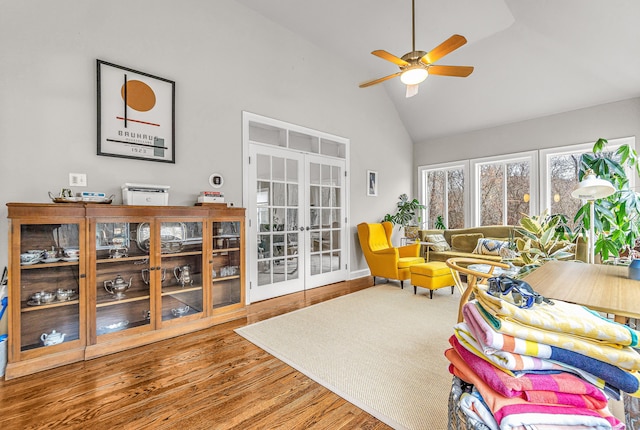38 Marlin Rd, Newtown, CT 06482 - living area with high vaulted ceiling, a ceiling fan, french doors, and wood finished floors