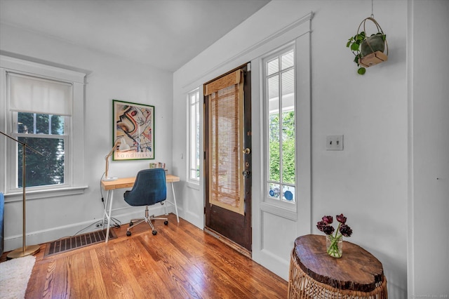19 Orpington St, Hamden, CT 06517 - entrance foyer with baseboards and wood finished floors