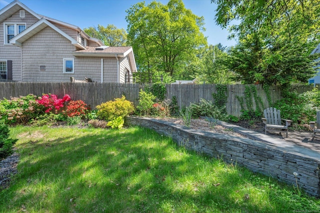 19 Orpington St, Hamden, CT 06517 - fenced backyard with a patio area