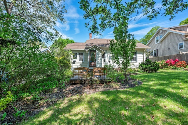 19 Orpington St, Hamden, CT 06517 - rear view of house featuring a chimney