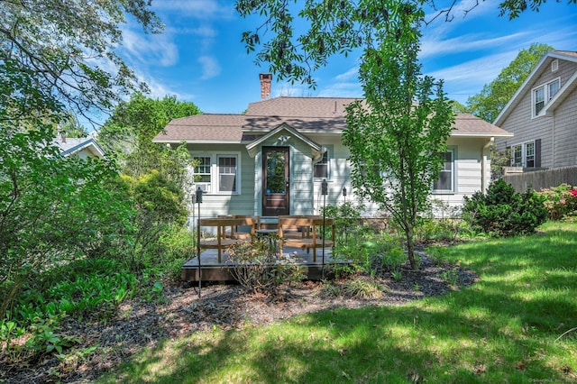 19 Orpington St, Hamden, CT 06517 - view of front facade featuring a chimney, a wooden deck, and roof with shingles