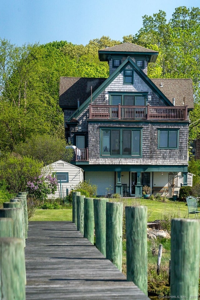 49 Bayberry Ln, Groton, CT 06340 - back of property with a balcony and roof with shingles