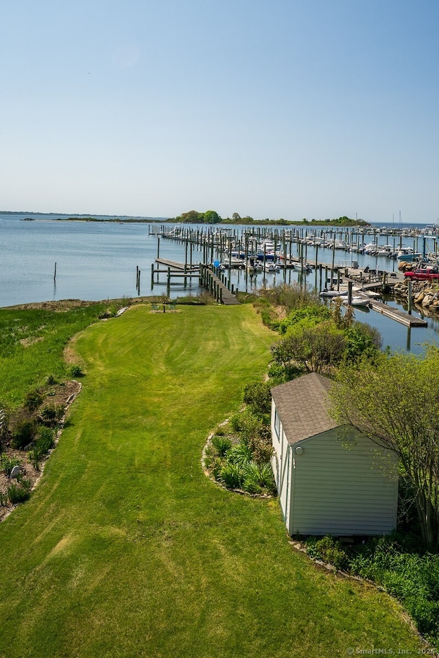 49 Bayberry Ln, Groton, CT 06340 - dock area with a water view, a lawn, and boat lift