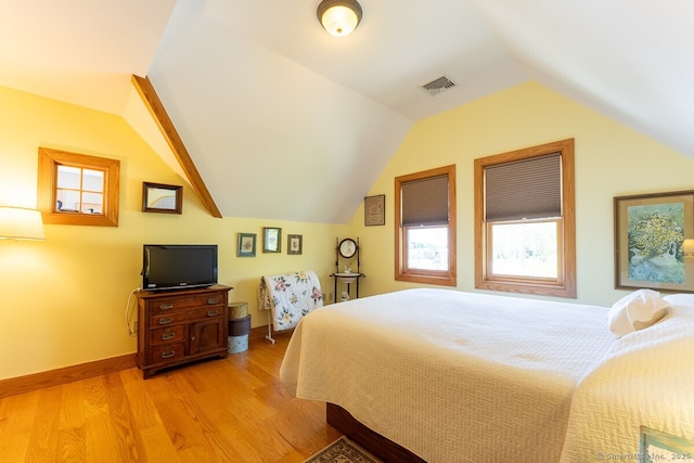 49 Bayberry Ln, Groton, CT 06340 - bedroom featuring light wood-type flooring and vaulted ceiling