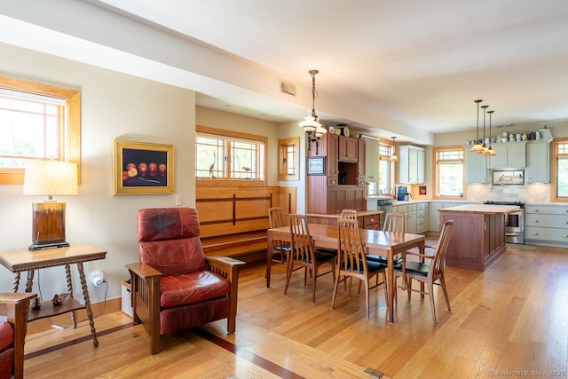 49 Bayberry Ln, Groton, CT 06340 - dining area featuring light wood-style floors