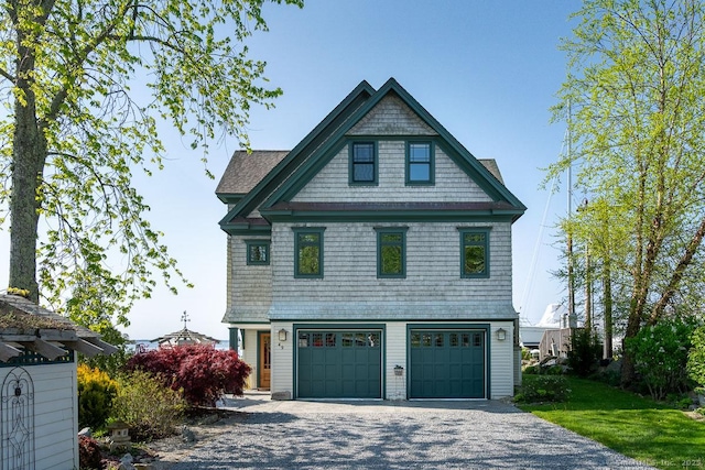 49 Bayberry Ln, Groton, CT 06340 - view of front of property with a garage and gravel driveway
