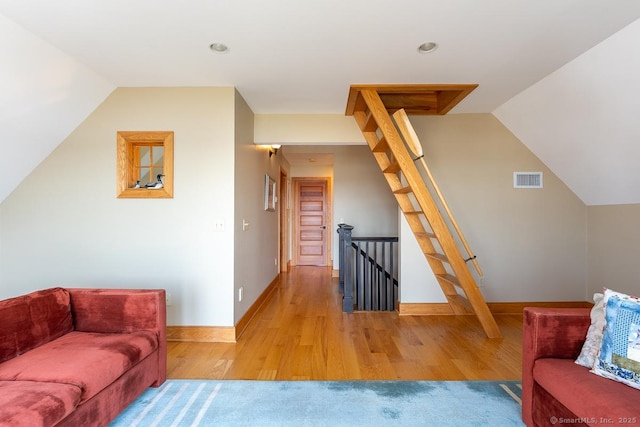 49 Bayberry Ln, Groton, CT 06340 - living room featuring light wood finished floors, vaulted ceiling, and recessed lighting