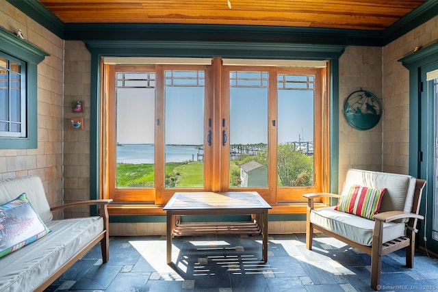 49 Bayberry Ln, Groton, CT 06340 - sunroom with french doors, stone tile floors, wood ceiling, and ornamental molding