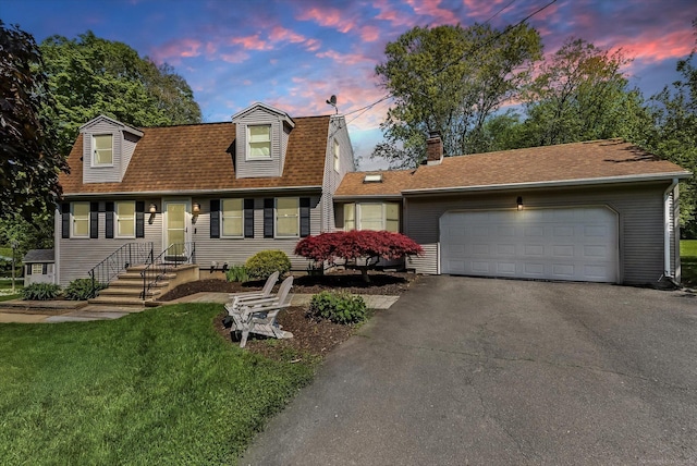 7 Beechwood Cir, Cromwell, CT 06416 - view of front of home featuring driveway, a garage, a yard, a chimney, and roof with shingles