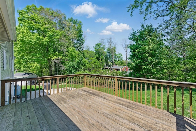7 Beechwood Cir, Cromwell, CT 06416 - wooden deck featuring view of scattered trees and a yard