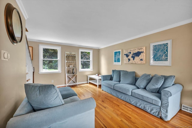 7 Beechwood Cir, Cromwell, CT 06416 - living area featuring crown molding, wood finished floors, stairway, and baseboards