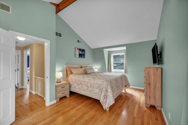 7 Beechwood Cir, Cromwell, CT 06416 - bedroom with light wood-style flooring, baseboards, beamed ceiling, and high vaulted ceiling