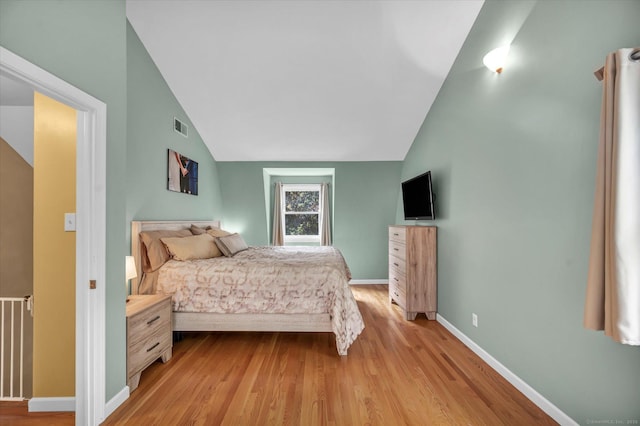 7 Beechwood Cir, Cromwell, CT 06416 - bedroom featuring vaulted ceiling, light wood finished floors, and baseboards