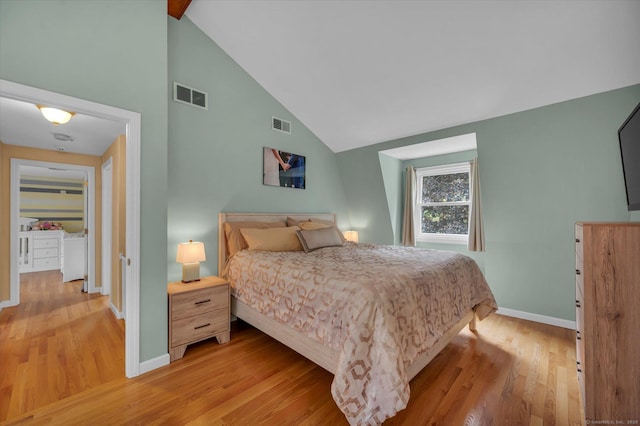 7 Beechwood Cir, Cromwell, CT 06416 - bedroom with light wood finished floors, baseboards, and high vaulted ceiling