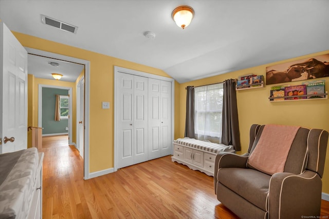 7 Beechwood Cir, Cromwell, CT 06416 - living area with light wood-style floors, vaulted ceiling, and baseboards