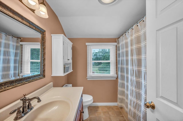 7 Beechwood Cir, Cromwell, CT 06416 - full bath featuring vaulted ceiling, vanity, toilet, tile patterned flooring, and baseboards