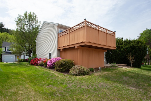 view of home's exterior featuring a yard